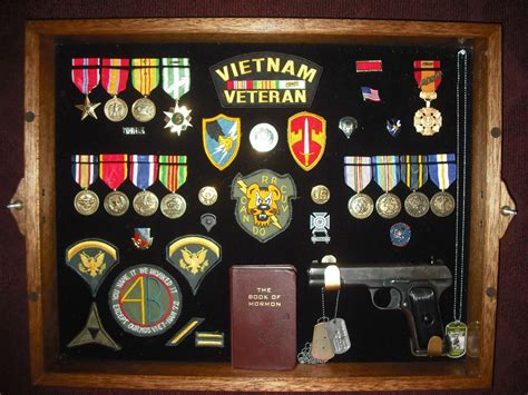 how do you attach metals in a shadow box|mount military medals in shadow box.